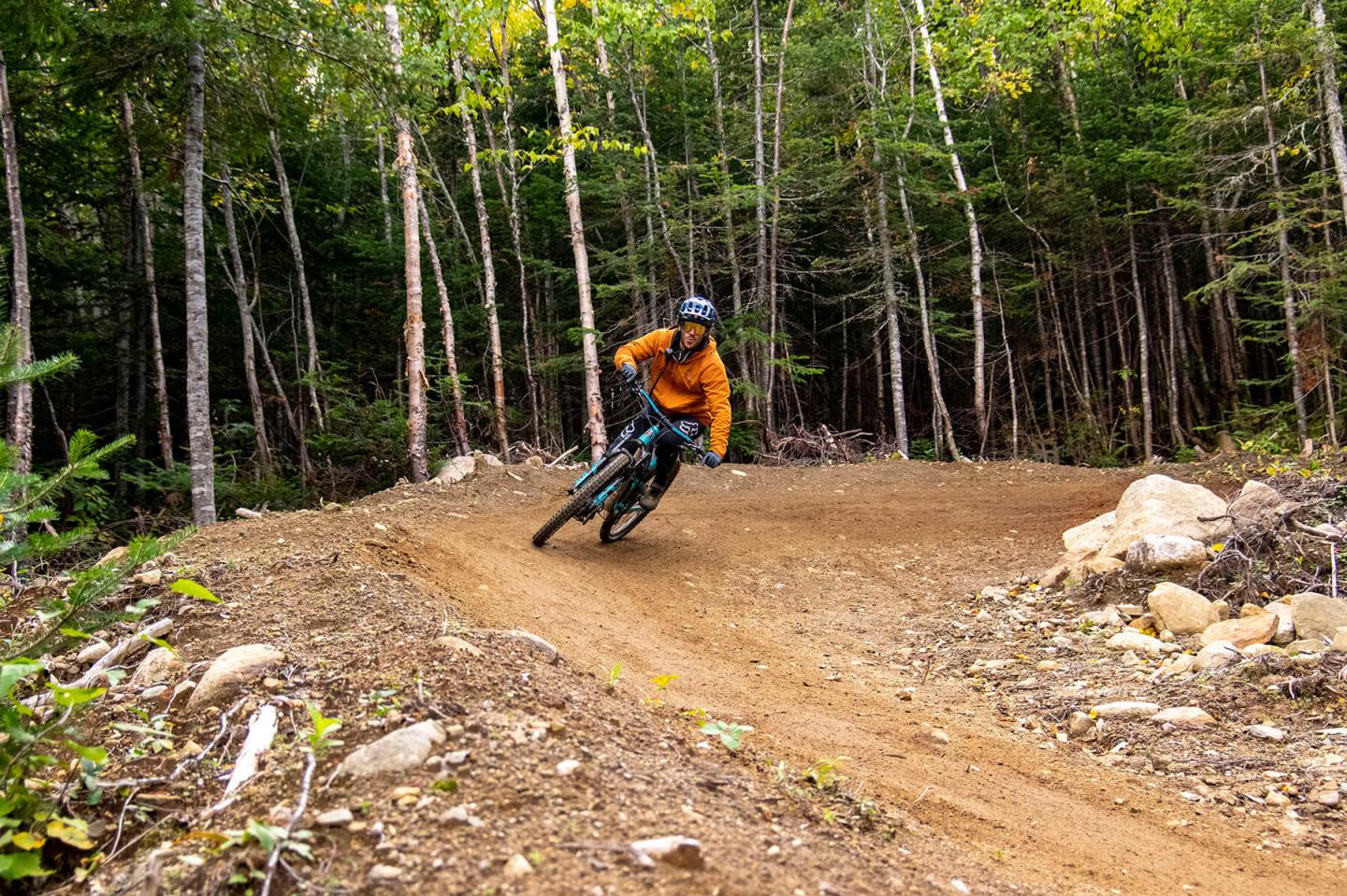 mountain biker going around turn
