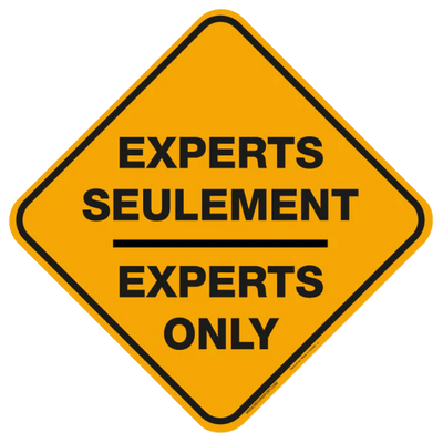 Panneau jaune indiquant "EXPERTS SEULEMENT".
