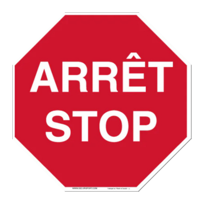 Panneau stop rouge avec texte "ARRÊT STOP".